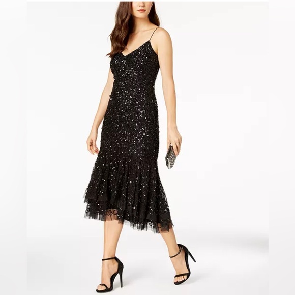 Shiny sequins and a sheer asymmetrical hem accentuate this sleeveless dress - Picture 6 of 6